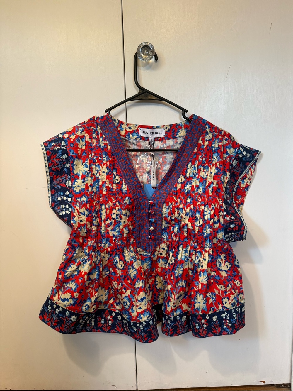 HUNTER BELL Red Floral V-Neck Short Sleeve Peplum Top with Navy Trim